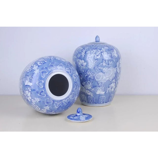 Elegant petty pitch made of hand-decorated porcelain, blue white colors. Beautiful rounded shape, with lid. Integral,...