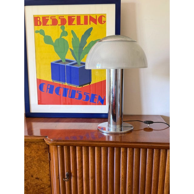 Mid-century modern table lamp Stilnovo Italy, 1960 ca. chromed metal, glass hat H 47 cm - 34 cm diam. Conditions:...