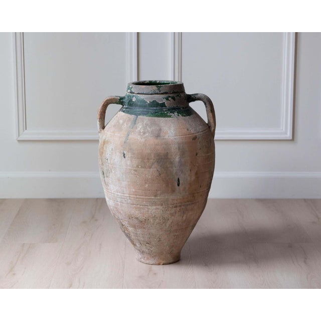 This 19th-century terracotta jar originates from the Balkan Peninsula, a region celebrated for its centuries-old ceramic...
