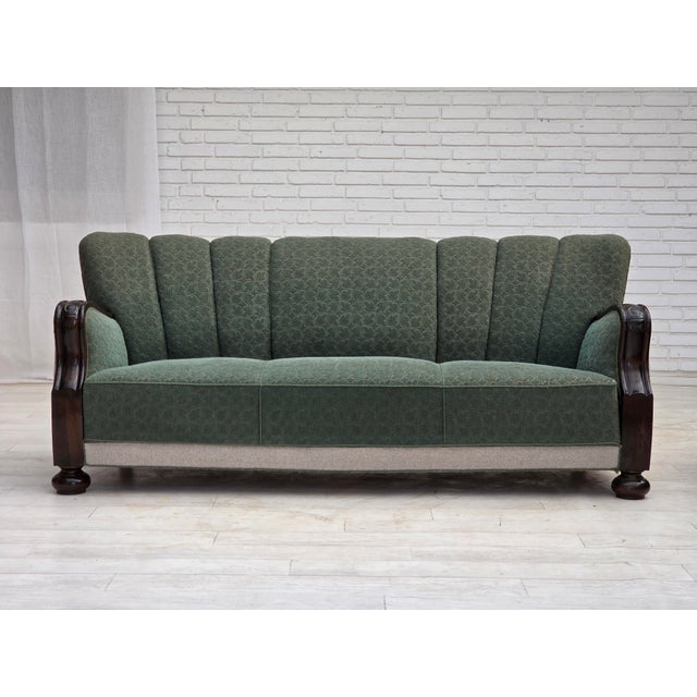 1960s, Danish 3-seater sofa. Green and light grey furniture wool, oak wood, brass springs in the seat. Original good...