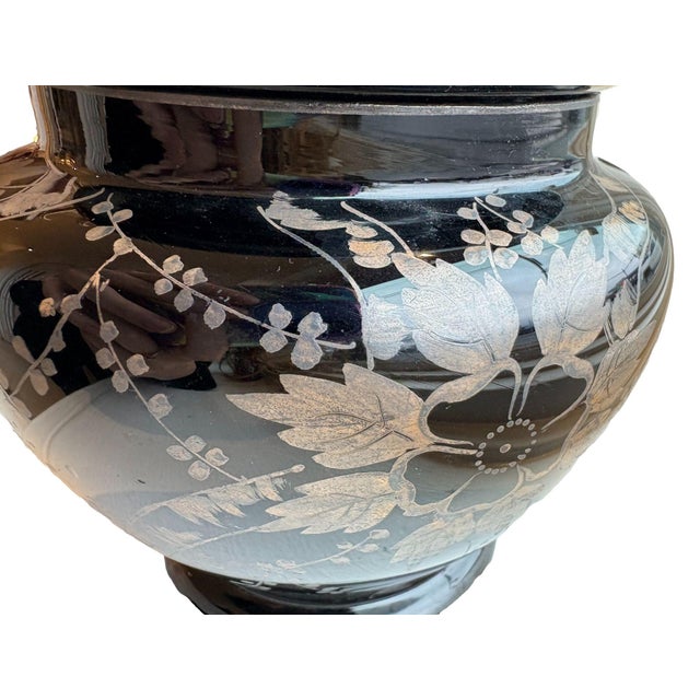 This breathtaking, antique, black Amethyst urn, crafted in Czechoslovakia, is adorned with a gleaming silver metal overlay...