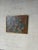 This striking abstract painting features a dynamic composition of expressive figurative faces. The heavily textured...