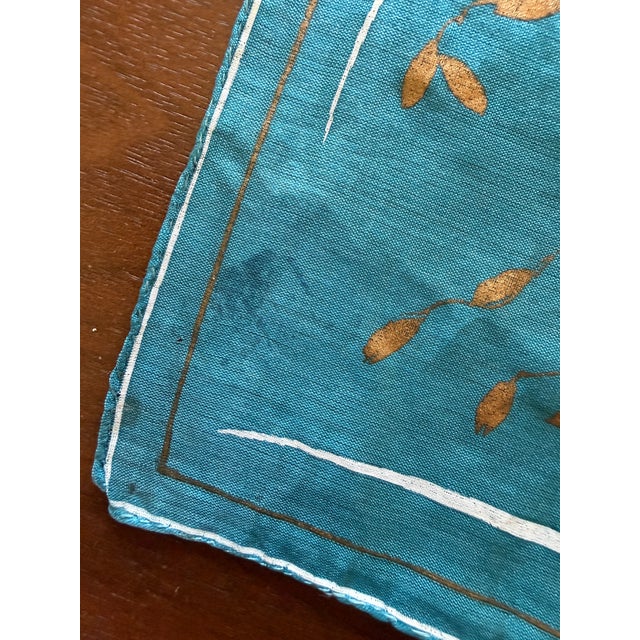 A beautiful vintage Vera Neumann pure silk scarf with hand-rolled edges and an elegant botanical print in bronze on a...