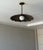 Add a warm, artistic statement to your space with this handmade black antique brass pendant light. Featuring sculptural...