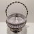 This lovely little nickle-plated Basket has its original crystal cut inset bowl and a twisted metal handle. The bottom has...
