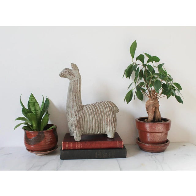 Mid-century textured plaster llama sculpture. No makers mark. Multiple chips. Pictured.