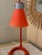 Postmodern Mathias Orange-Red Adjustable Desk Lamp With Circular Base – Retro Design For Sale - Image 6 of 8