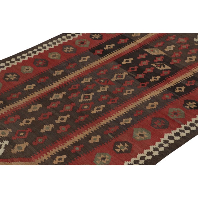 This vintage 5x11 Persian kilim is a Shahsavan rug of rare design—handwoven in wool circa 1950-1960. Further on the...