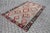 This beautiful, traditional vintage, flatweaved Turkish kilim rug is approximately 60 years old. It is handmade of very...