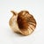 This elegant "Cornucopia" (Horn of Plenty) vase is part of the iconic "Granada Gold" collection by Stangl Pottery....