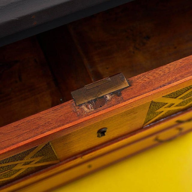 This stunning vintage chest of drawers is a perfect example of functional and refined design. It features exquisite inlay...