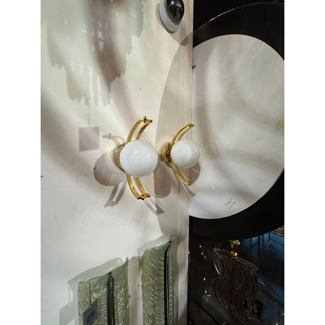 Pair of Murano Ball Sconces. Perfect for any design from traditional, mid-century, transitional. These can truly fit into...