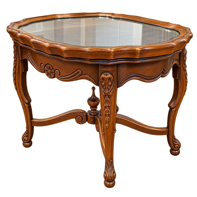 Elegant French Louis XV-style walnut tea/occasional table featuring an unusual removable glass serving tray with a...