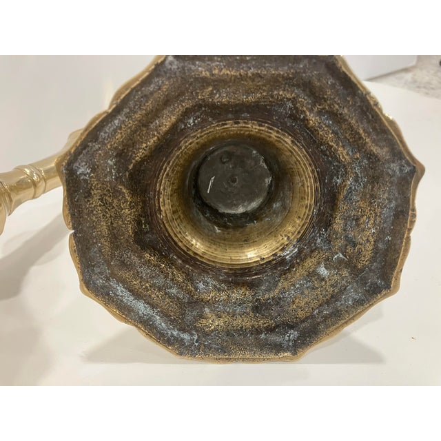 This pair of solid brass candle sticks dates from the Louis XIV period ( 1643-1715) Purchased in Avigion at the antique...