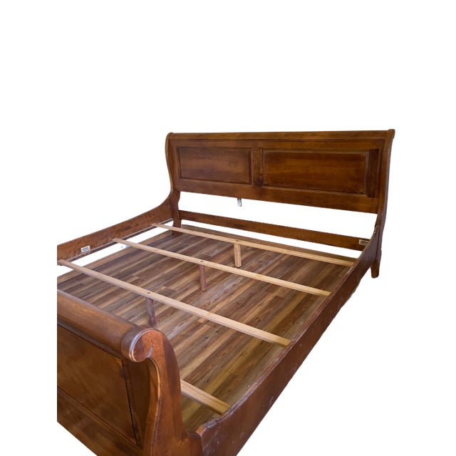 Ethan Allen Country French Sleigh Bed King size. This bed is in excellent condition. The warm wood tone is a timeless...