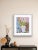 An original unframed contemporary still life painting by Michelle Heimann. A flowering plant inside a sculptural face...
