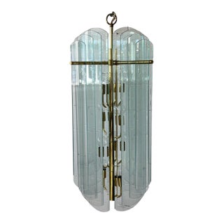 1970s Modernist Graduated Beveled Glass Chandelier With Brass Accents, 16 Panels For Sale