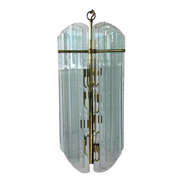 1970s Modernist Graduated Beveled Glass Chandelier With Brass Accents, 16 Panels For Sale