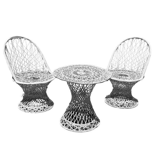 Stylish three-piece Mid-Century Modern spun fiberglass patio set in the style of Russell Woodard. This sculptural set...