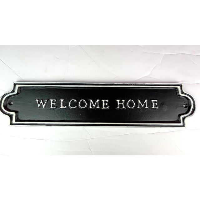 Contemporary Black White Metal Welcome Home Sign Dimensions: 17.75”w x .4”d x 4.2”h