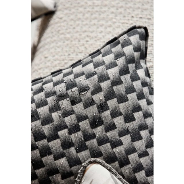 Originally an embossed vinyl Skiva now appears as a printed fabric using ombre tones to create a dimensional quality....
