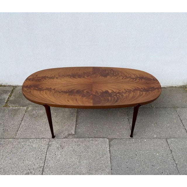A rare high-quality oval/elliptical coffee table number 514 designed by Bendt Winge and made at Aase Dreieri in Norway...
