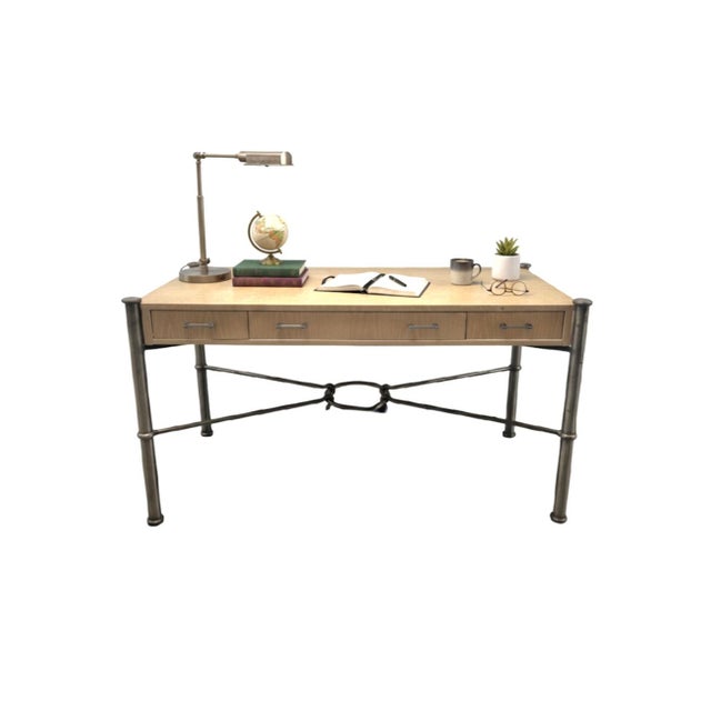 A beautiful vintage light tan and steel 3 drawer writing desk by Jay Spectre for Century. The desk features 3 pull out...