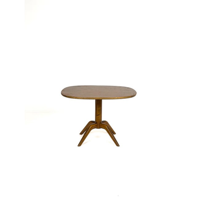 Designed by Bertil Söderberg for Svensk Hemslöjd during the 1930s, this elegant table represents the refined craftsmanship...