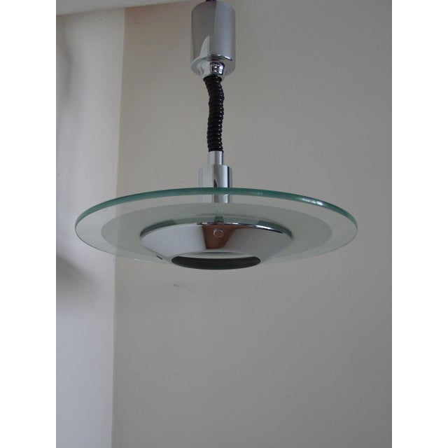 Helestra Pendant Lamp in Chrome and Glass, Germany, 1970s, in Very Good conditions. Designed 1970 to 1979 Up to 250V...
