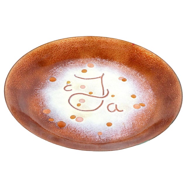 Decorative enameled bowl in excellent original condition, signed “ Betta “ ( ? ) on verso, as shown. The bowl features an...