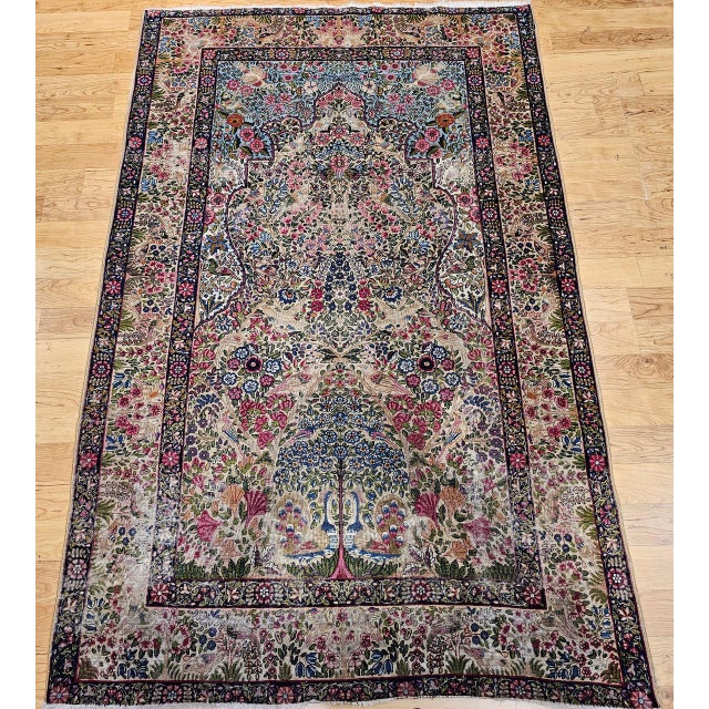 "Prepare to be astonished by this truly magnificent Early 20th Century Persian Kerman Lavar rug, a profound testament to...