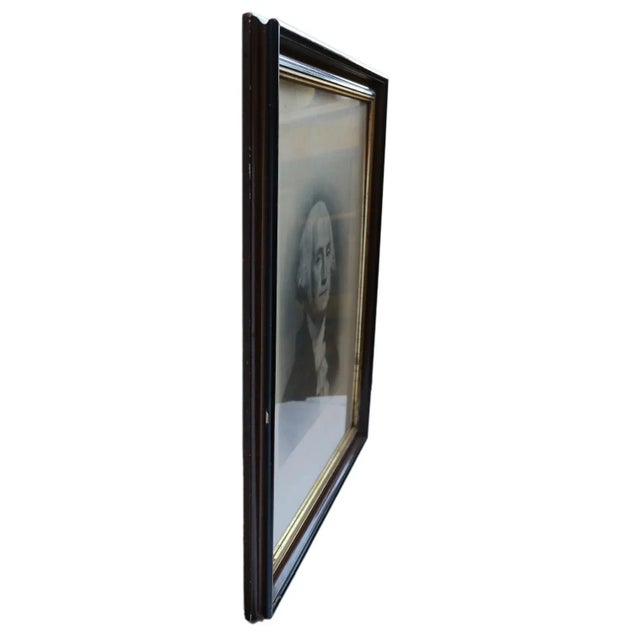 A lithograph portrait of George Washington. "copyright 1895, by the Taber Art Co." Note the wear and tear.