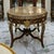 Elevate your space with this elegant Victorian French style center table, crafted in solid wood and adorned with refined...