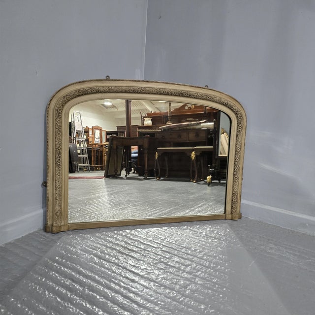 A very good English Victorian green painted overmantle mirror in overall very good condition. 44" wide 30" high