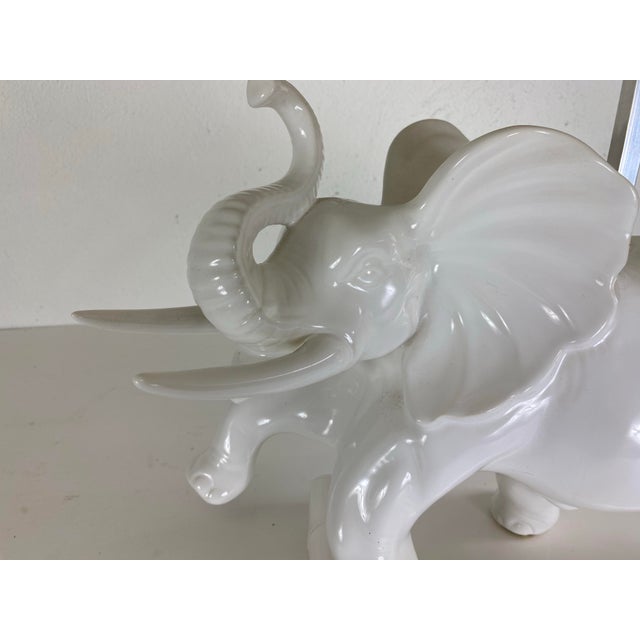 This is a mid-century vintage oversized Italian pottery elephant lamp. This Italian white pottery lamp has a handmade silk...