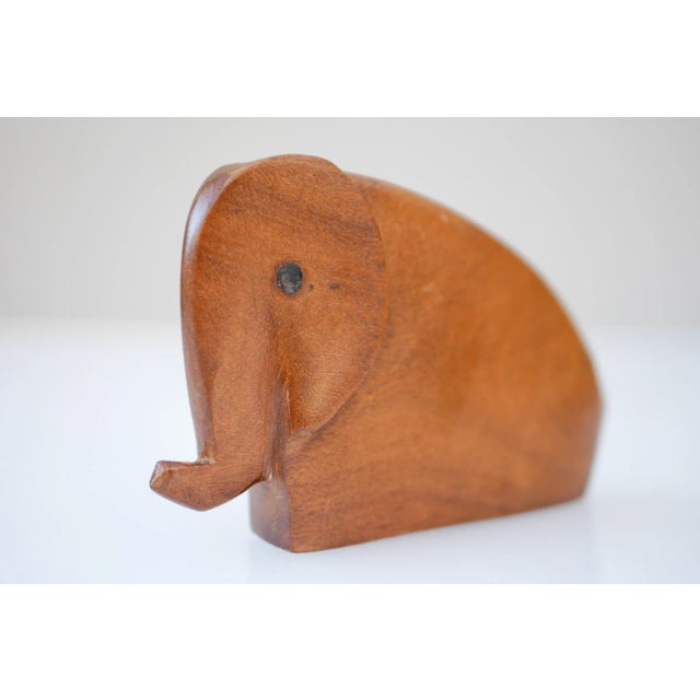 A fantastic and rare carved Danish teak elephant figurine, from 1960s. This is typical of Scandinavian minimalism, a nice...