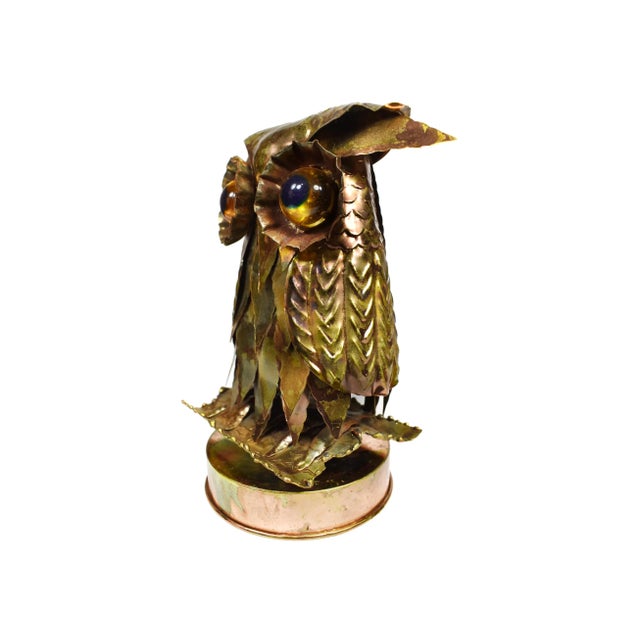 This is a unique yellow-eyed metal owl sculpture. Unique piece for your home decor or a gift idea to owl collector. This...