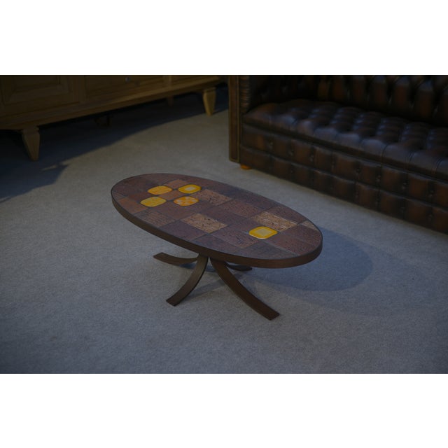 Lava Stone and Ceramic Coffee Table attributed to Jean Jaffeux, 1960s-1970s, in Flawless conditions. Designed 1960 to 1969...