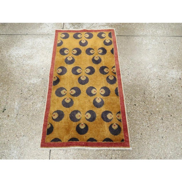 A vintage Turkish Anatolian Deco throw rug handmade during the Mid-20th century. Measures: 1' 11" x 3' 6"