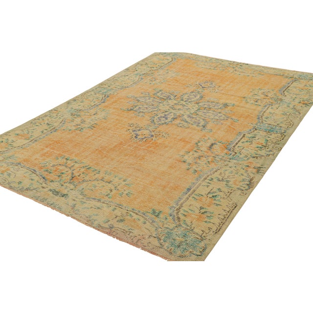 Rug & Kilim Vintage Zeki Müren Rug in Orange Open Field With Floral Medallion | Rug & Kilim For Sale - Image 4 of 7