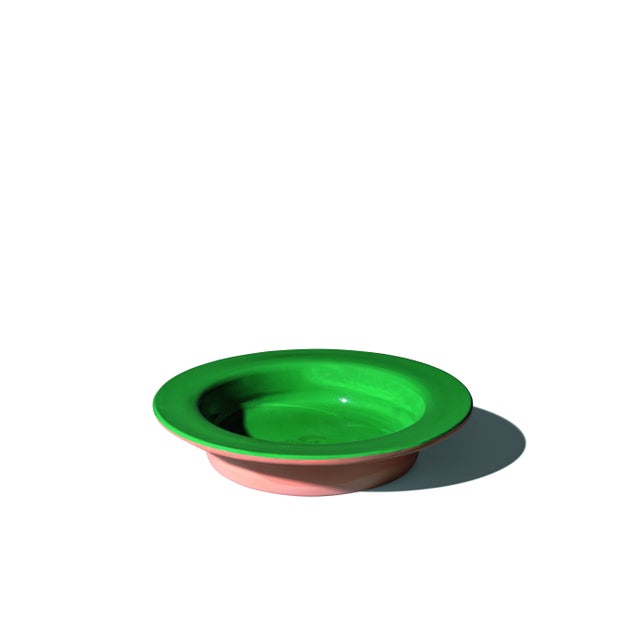 Terracotta centrepiece with ceramic inside and lapel enameled, made entirely by hand.