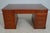 Age: Approx: 10 Years Old Details: Brown Tooled Leather Top Dovetailed Drawer Construction Quality Construction Quality...