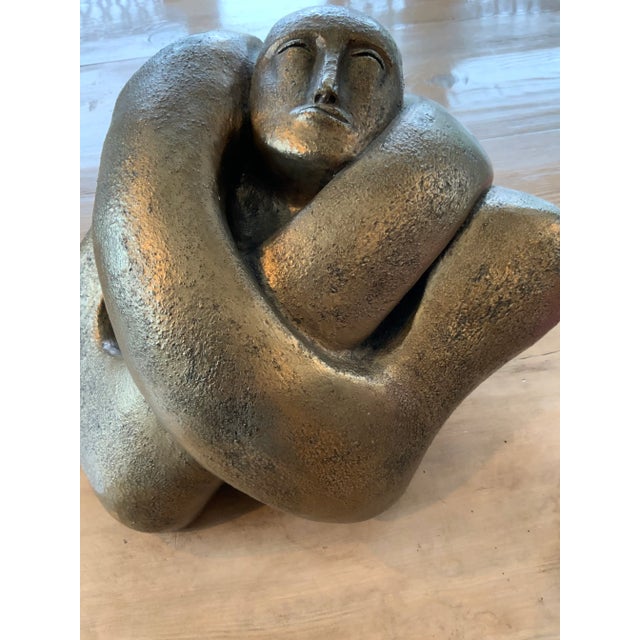 Sometimes you just need a hug… and this sculpture does it! Carole Schultz’s Woman Self-Hug is a dramatic, solid statement...