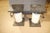 This elegant pair of marble pedestal stands is a timeless expression of classical architectural design, offering both...