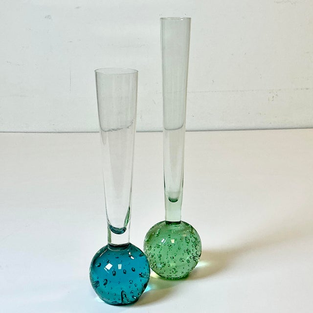 A set of two lovely Bud Vases from Italy. They feature a green and Turquoise bubble base that is hand blown glass with...