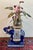 Colorful ceramic elephant garden stool with navy, cream, garnet and gold glazing. Suitable for use indoors or out as a...