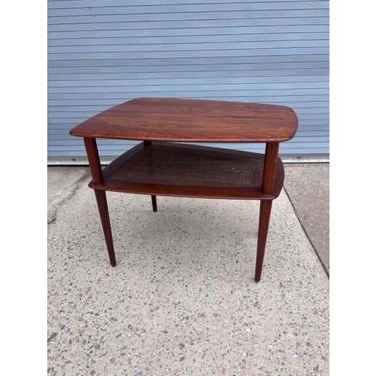 Hvidt and Molgaard Solid Teak end Table with Cane bottom shelf. Top newly refinished and ready to go! Great scale and...