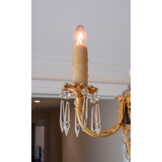 Age: C. 1900-1910 Details: Caryatid heads and classical motif Drape crystals 5 arm electrified chandelier Stunning vintage...