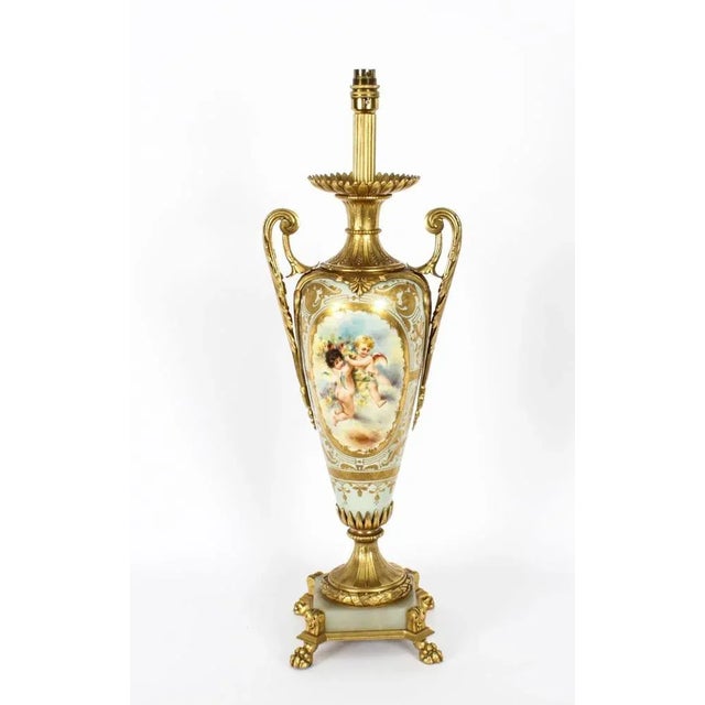 This is a stunning large antique French Sevres hand-painted porcelain and ormolu mounted vase circa 1870 in date, later...