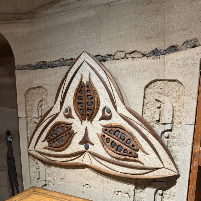 For your consideration, carved wooden decorative wall relief featuring a triangular or trefoil-like geometric motif with...